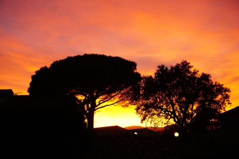 In the other direction: Sunset behind the house