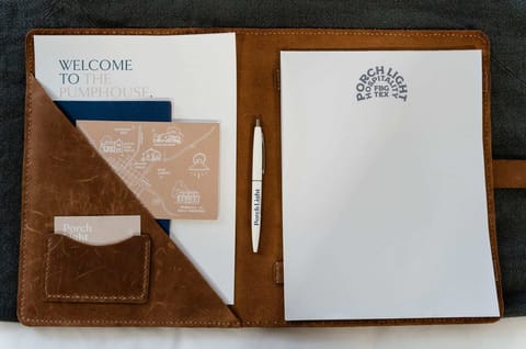 Welcome book – local guide, map, and Porch Light Hospitality details.