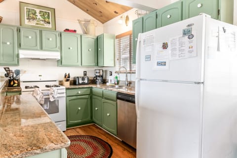 Kitchen - Full kitchen with stove/oven, refrigerator, dishwasher, microwave, blender, toaster, coffee maker, dishes, pots/pans, & more.
