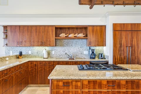 Kitchen with Island, Coffee Maker, and Refrigerator