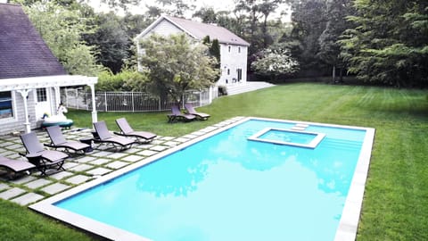 Heated custom gunite Pool & Hot Tub w/ marble dust finish overlooks massive lawn