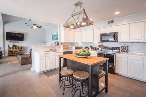 Kitchen equipped with all cooking and dining essentials
