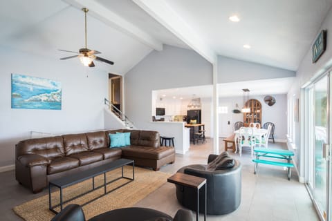 Open concept living, kitchen, and dining areas