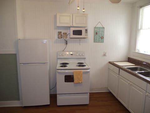 Fridge, microwave, coffee/tea maker, toaster