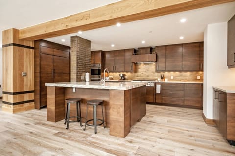 Modern kitchen with bar seating for 2.