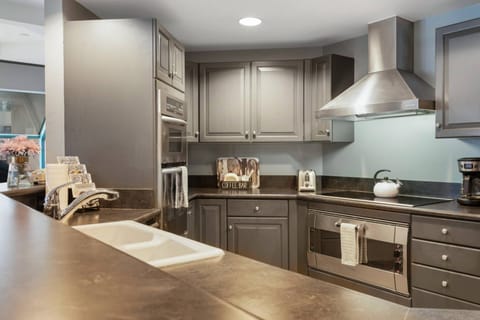 Kitchen is stocked with a Drip Coffee Maker, Toaster, Tea Kettle, Crock Pot, Blender and Hand Mixer.