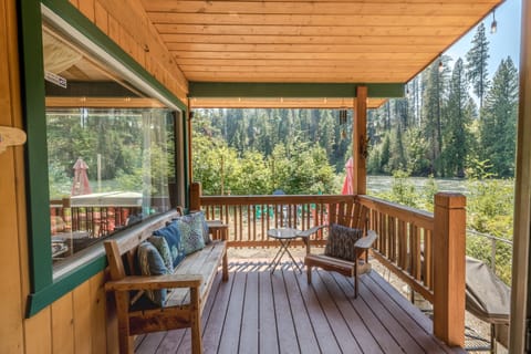 Back covered porch overlooking the river