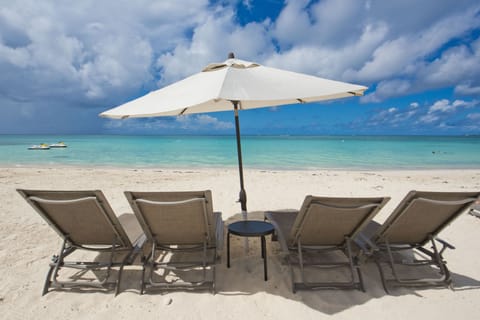 On the beach, sun loungers