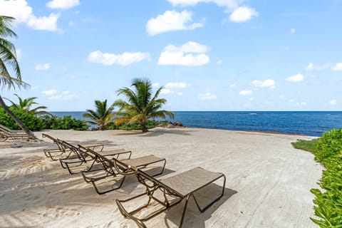 On the beach, sun loungers, beach towels