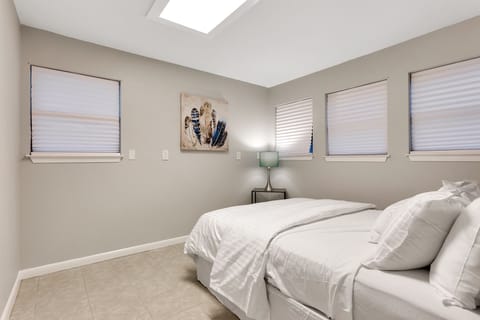 Bedroom 7 is in the smaller home has a luxury queen pillow top with bathroom.