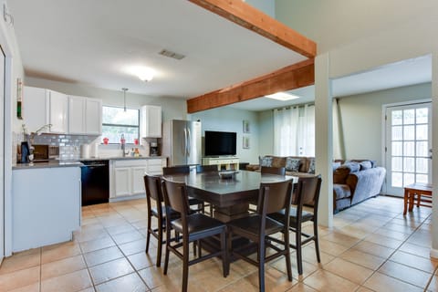 Full kitchen, dining and living space in the smaller house.