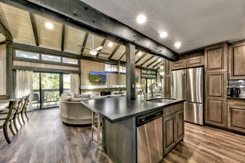 Flow seamlessly between the cooking, dining, and living spaces