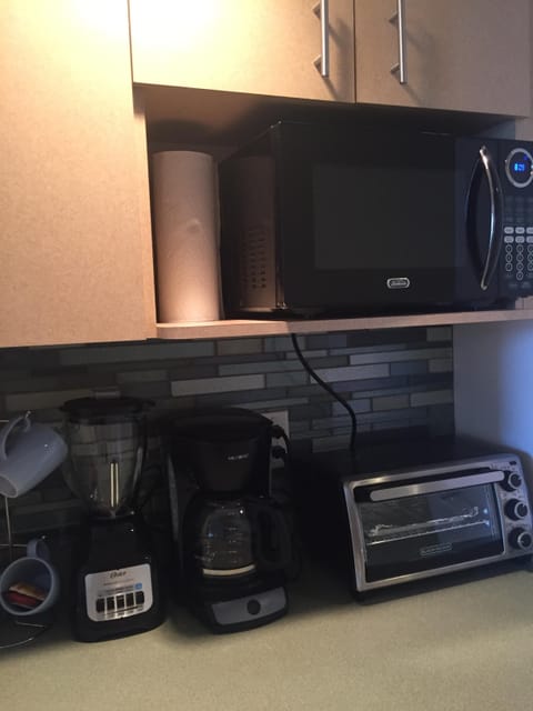 Fridge, microwave, coffee/tea maker, toaster