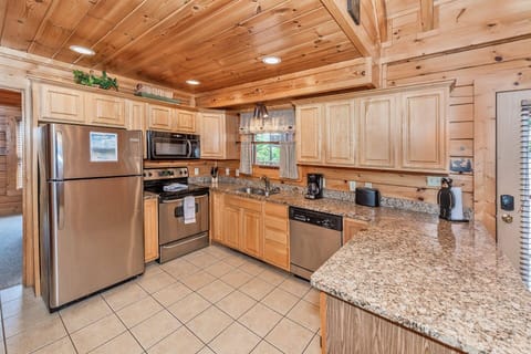 The heart of the home. The sleek granite countertops provide both style and functionality, perfect for meal prep or casual dining.