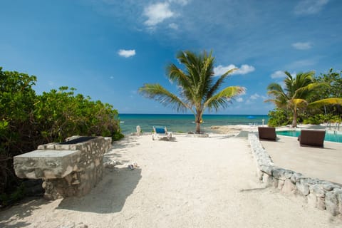 On the beach, sun loungers, beach towels