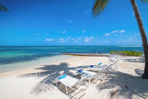 On the beach, sun loungers, beach towels