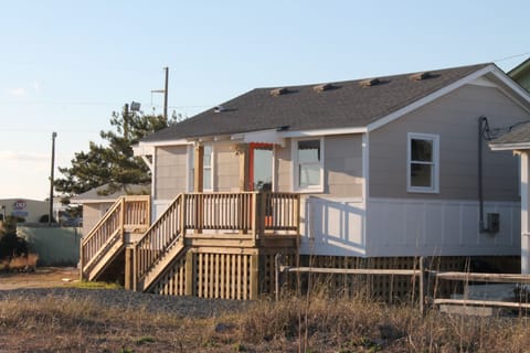 East exterior view of Tandem Cottage.