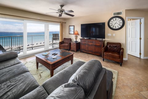 Living Room View - Spacious beach front living room with balcony access and awesome views!