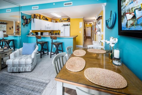 Living Room - Looking back to the kitchen from the living and dining area.