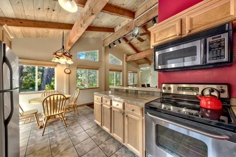 The kitchen is stocked with all the appliances, pots, and pans you'll need. Just bring your food and recipes