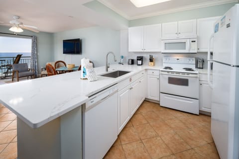 Kitchen - Fully equipped kitchen has all utensils, cookware, pots and pans one needs for basic cooking.