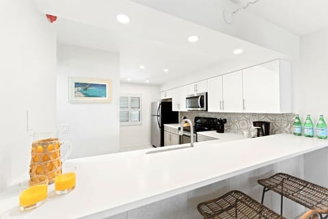 Bright & Coastal Newly renovated kitchen with quartz counters