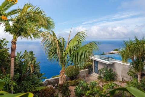 A heated pool, sun loungers