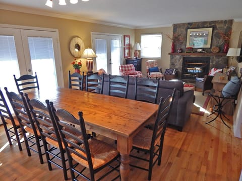 Dining Table for 10 plus 4 bar stools. Stone Gas Fireplace and plenty of Family Room Seating.