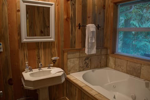 Bathtub, jetted tub, hair dryer, towels