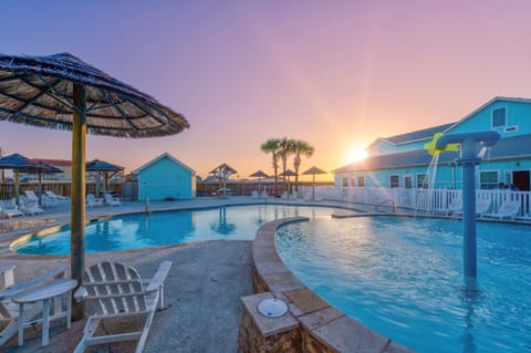 A heated pool, sun loungers