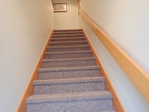 Interior stairwell up to apartment
