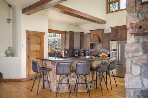 Kitchen with breakfast bar seating for five