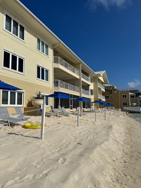 On the beach, sun loungers, beach towels