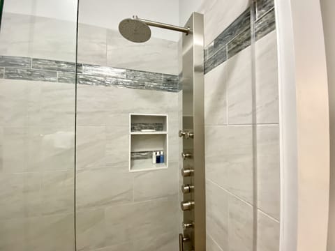 Shower, rainfall showerhead, towels