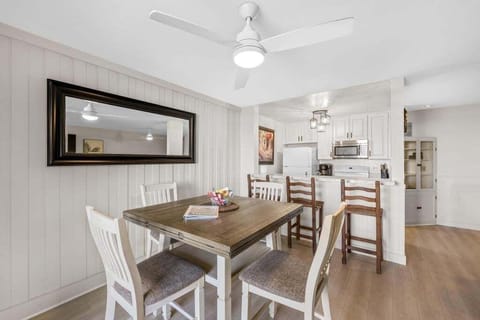 The dining space has enough seating for four guests.