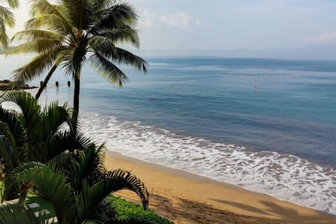 On the beach, sun loungers, beach towels