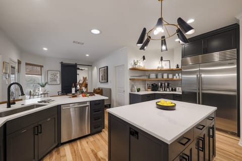 Open kitchen makes conversations between rooms very easy.