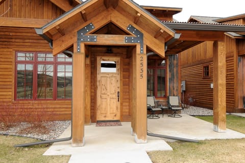 Front entrance to the Bridger Bungalow with a nice patio and barbecue grill.