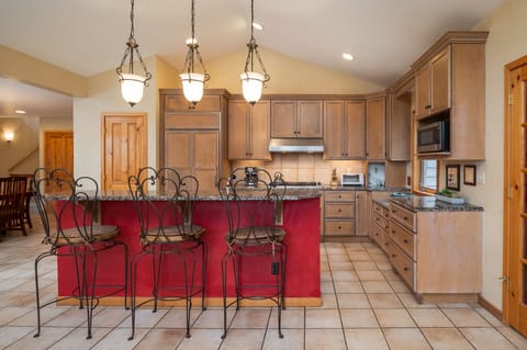 Large kitchen with breakfast bar