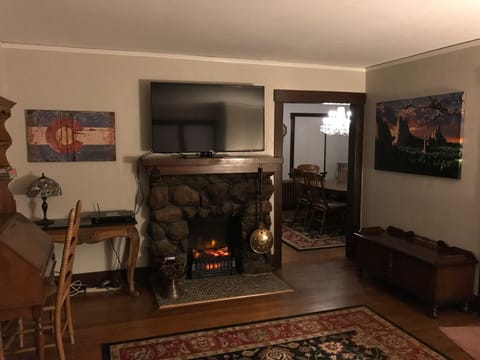 Living Room with stone fire place and electric fire place  insert.