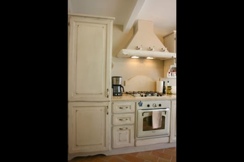 Cabinetry, Room, Furniture, Property, Kitchen, Countertop, Interior Design, Floor, Lighting, House