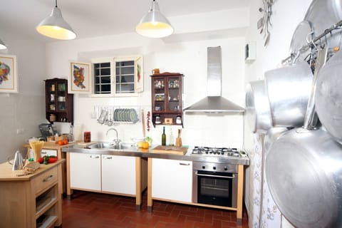 Room, Kitchen, Property, Cabinetry, Furniture, Countertop, Interior Design, Floor, Building, Refrigerator