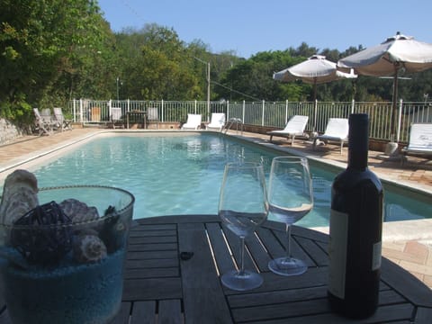 Water, Property, Swimming Pool, Azure, Plant, Tree, Outdoor Furniture, Bottle, Sky, Leisure