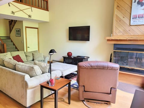 Living area with Fireplace and TV