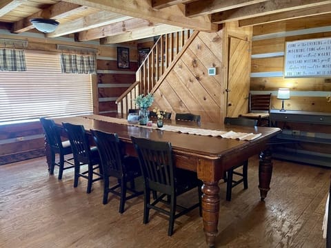 Dining table seats 12 and stairs to 2nd level