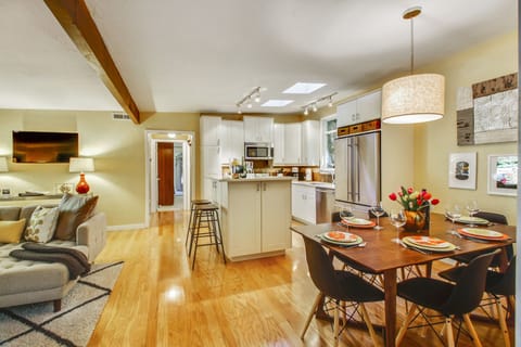 Easy access from kichen counters to dining table to friends in the living room.