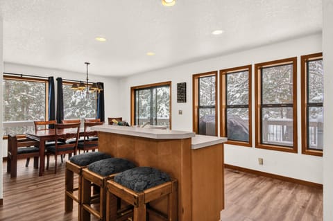 The island has a separate sink and the dishwasher