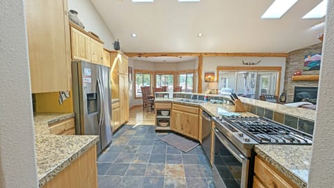 The kitchen is full of beautiful stainless steel appliances