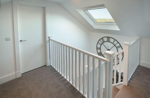 A light and airy staircase leads to the two first floor bedrooms