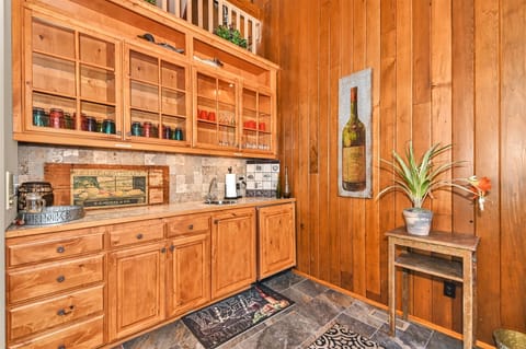 The wet bar on the way out to the pool